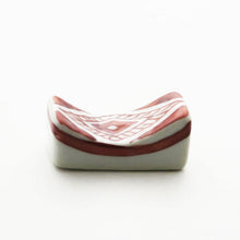 Load image into Gallery viewer, Chopstick rest with pebbled pattern (red)
